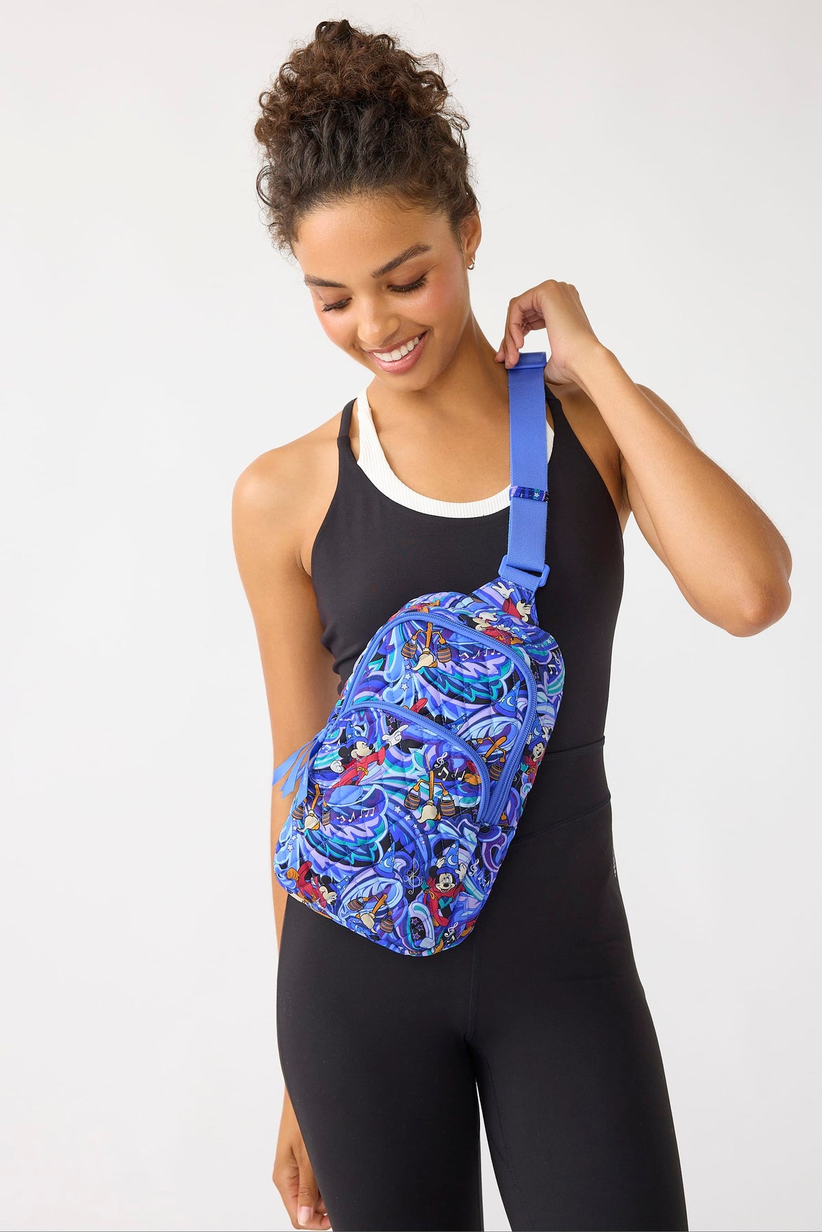 Disney Lorman Sling Backpack in Fantasia Swirls