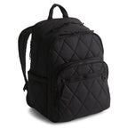 Black quilted backpack on a white background