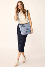 Disney Harwick Large Messenger in Stitch Leafy Blooms Chambray